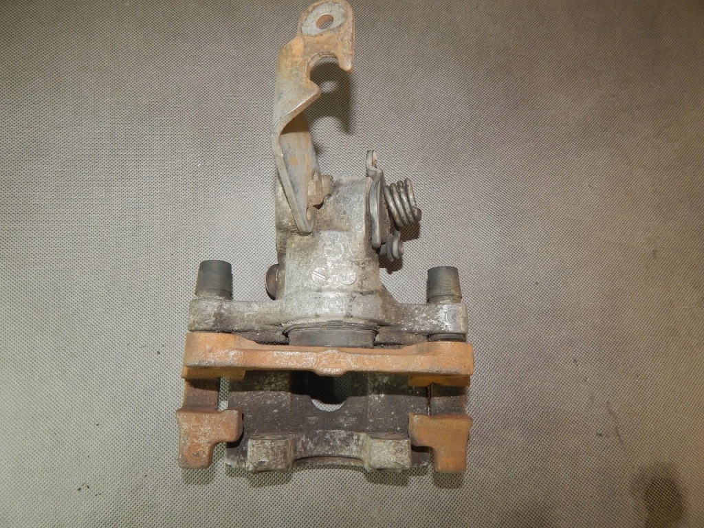 фото №3, Nissan primera суппорт тормозной левый задняя