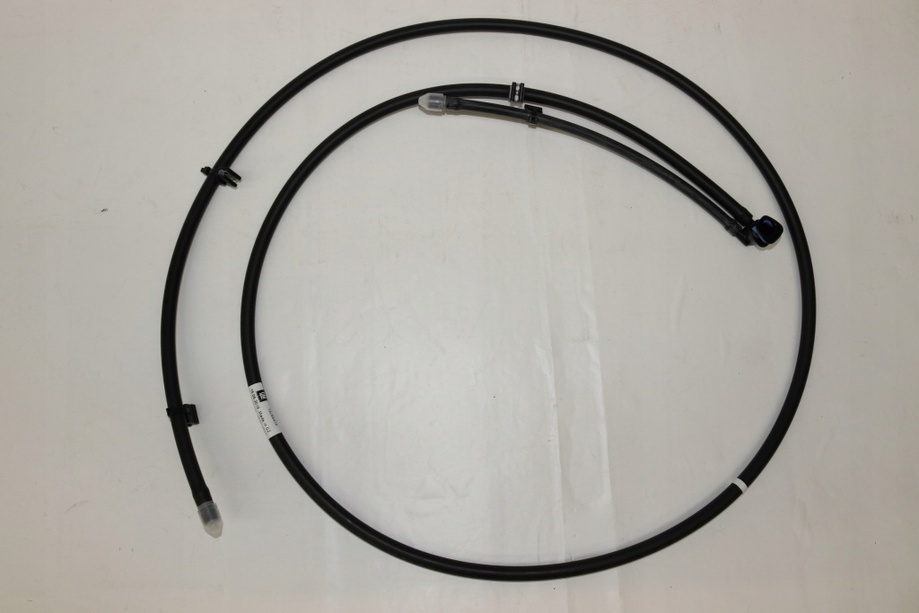 фото №1, Opel astra j iv пабтрубок  омывателя фары новый