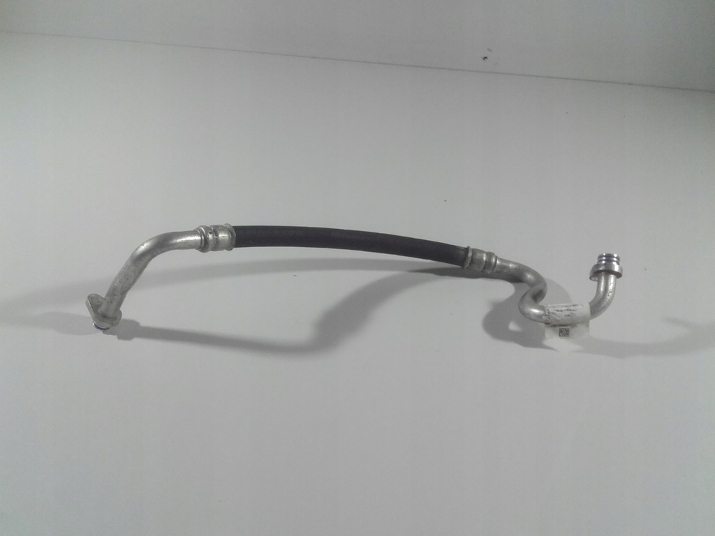 фото №9, Jaguar оригінальний номер gx73-19n602-bc шланг кондиціонера