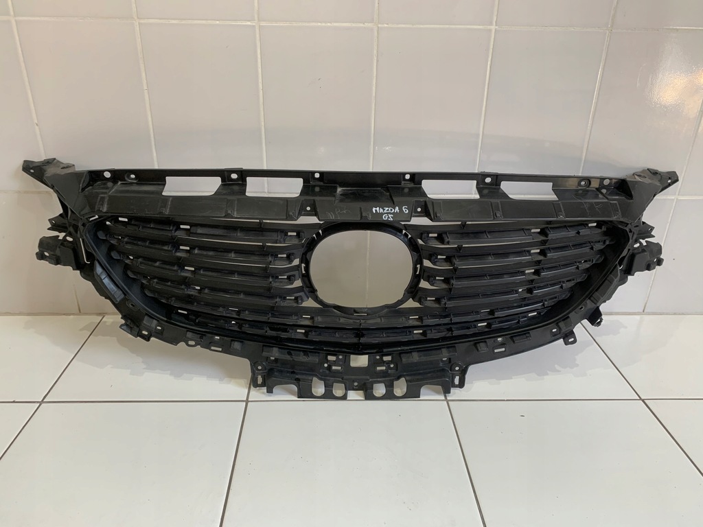фото №1, Mazda оригинальный номер g46l-50712 решётка радиатора решётка радиатора