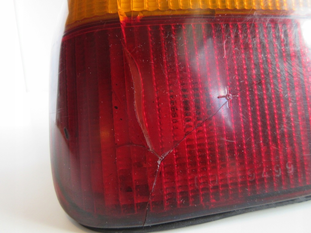 фото №14, Лампа задня ліва + вкладиш lancia dedra оригінал