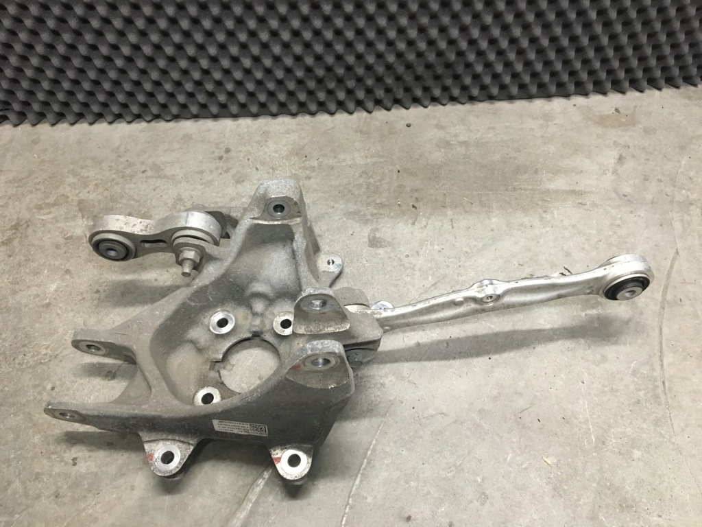 Tesla x поворотний кулак задня права сторона 1027416-00 Оригінал