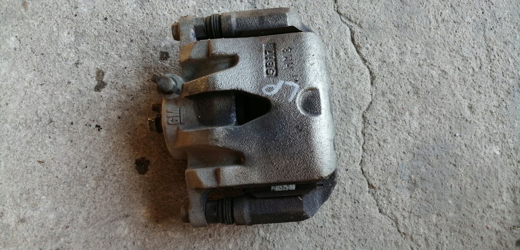 фото №1, Opel karl 1.0 суппорт левый передний