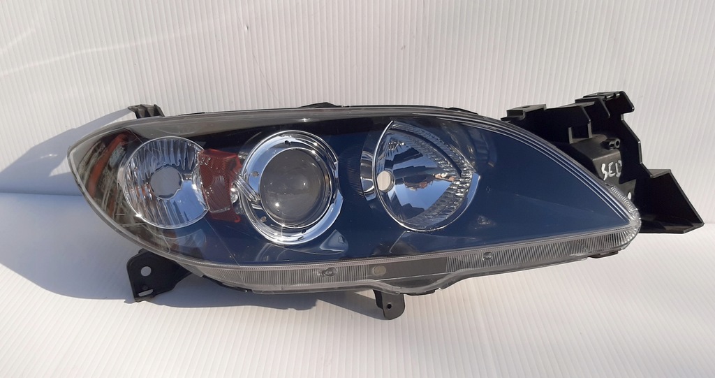 фото №1, Фара лампа перед правий sedan mazda 3 iii 03--