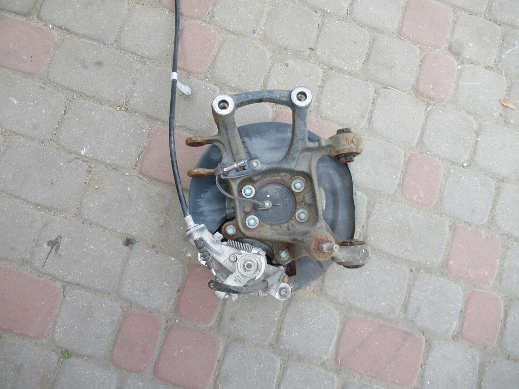 фото №2, Mazda 3 iii поворотний кулак ліва задня