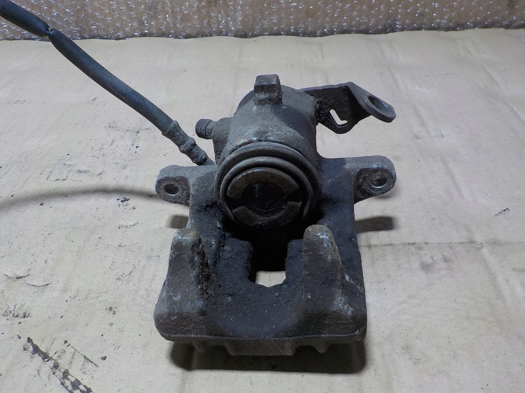 фото №6, Fabia ii roomster 1.9tdi суппорт правый задняя