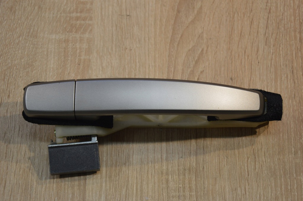 фото №1, Ручка наружная левый задняя captiva серебристая