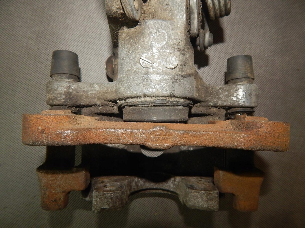 фото №4, Nissan primera суппорт тормозной левый задняя