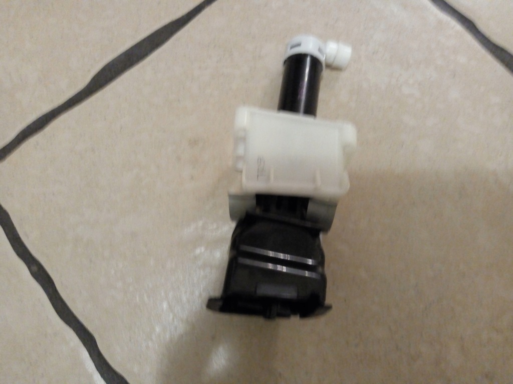 фото №1, Nissan leaf mod 11-17 омыватель лампы левый