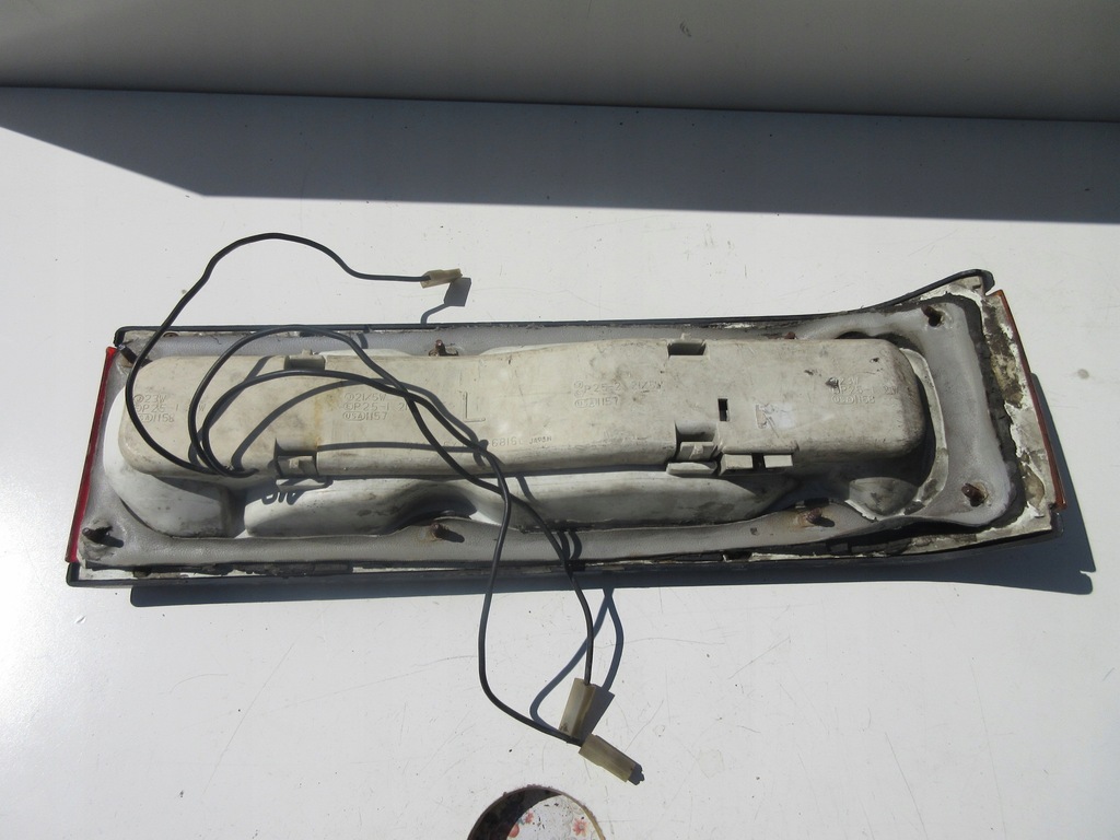 фото №7, Лампа задняя левая mazda 323 bd 043-6818l 1980-82