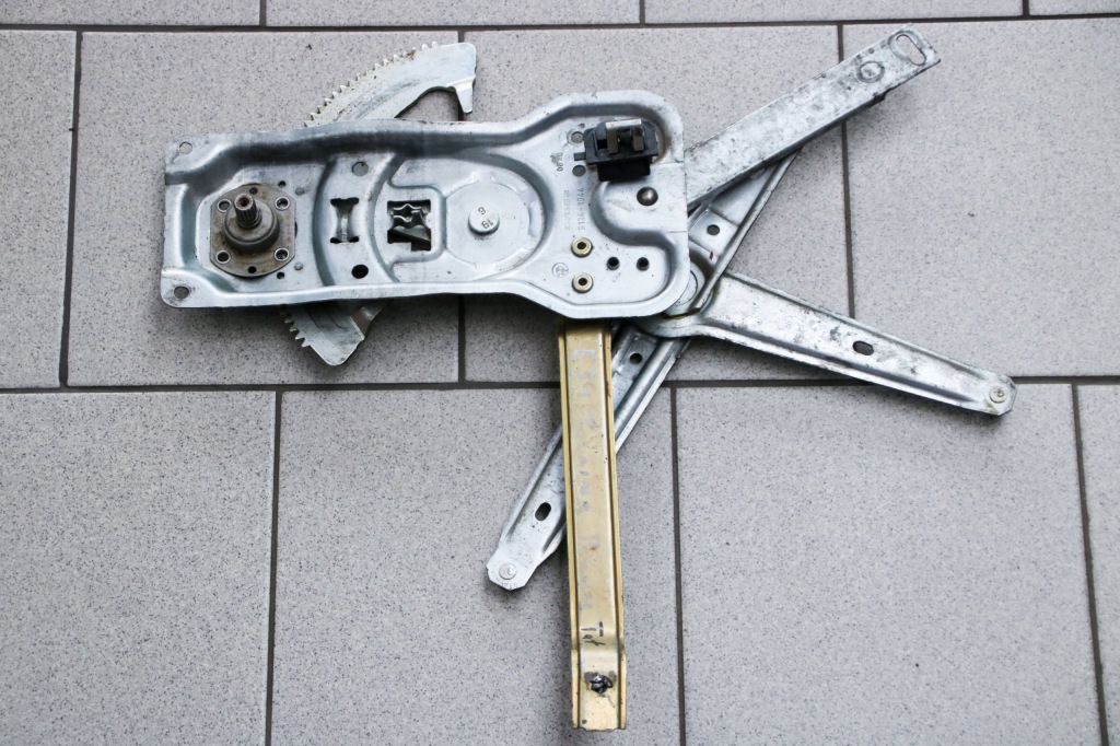 фото №1, Bmw e34 підйомник скло правий задня 1944064