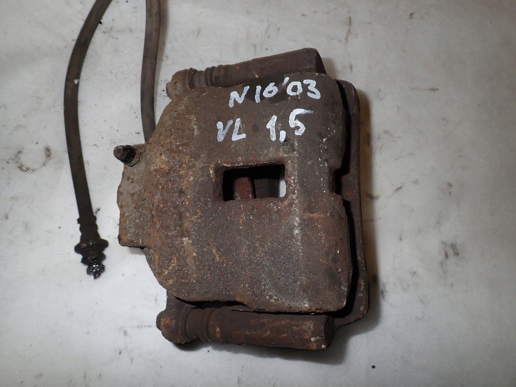 фото №1, Nissan almera n16 00-06 суппорт передний левый