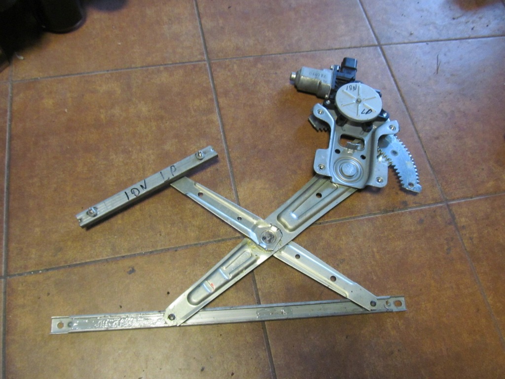 фото №1, Peugeot ion 10- подъемник окон левый перед c401