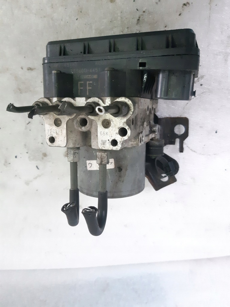 фото №2, Mazda оригинальный номер 1338004451 насос блок управления abs