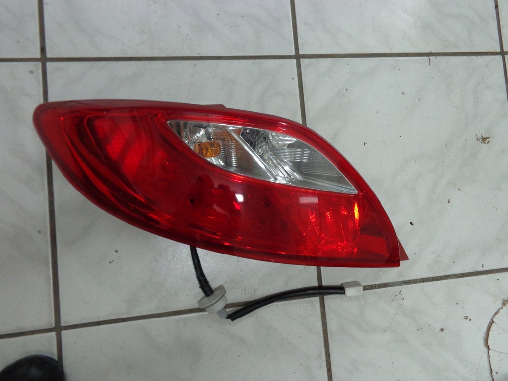 фото №1, Mazda 2 2007-2015 лампа ліва задня оригінал
