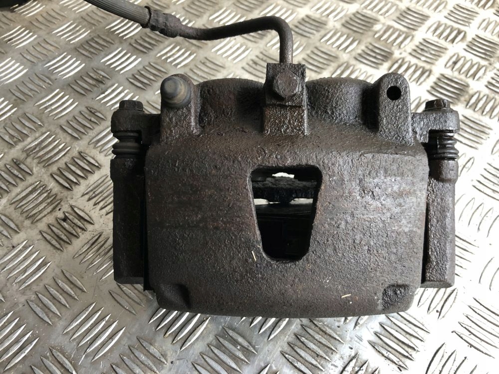 фото №1, Jeep cherokee iii суппорт тормозной левый перед