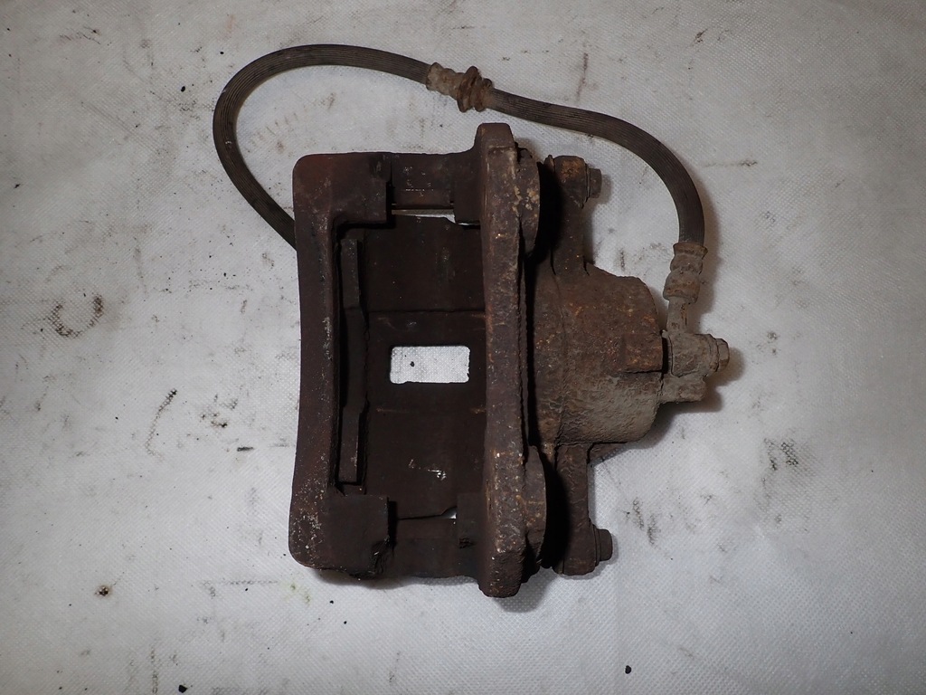 фото №6, Nissan almera n16 00-06 суппорт передний левый