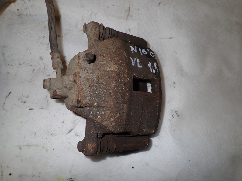 фото №4, Nissan almera n16 00-06 суппорт передний левый