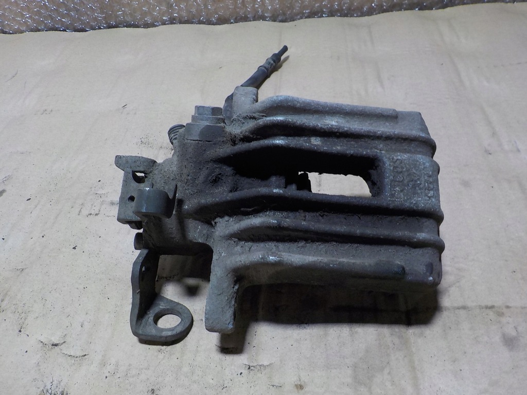 фото №1, Fabia ii roomster 1.9tdi суппорт правый задняя