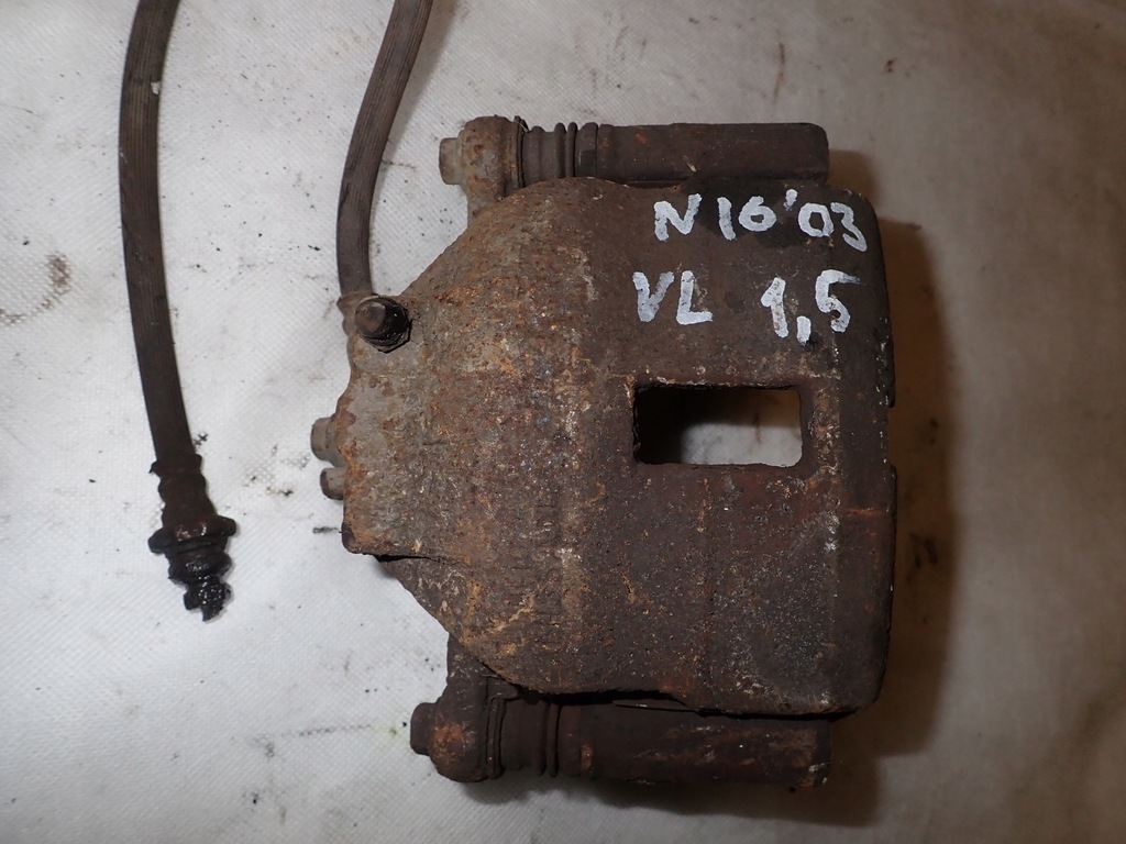 фото №3, Nissan almera n16 00-06 суппорт передний левый