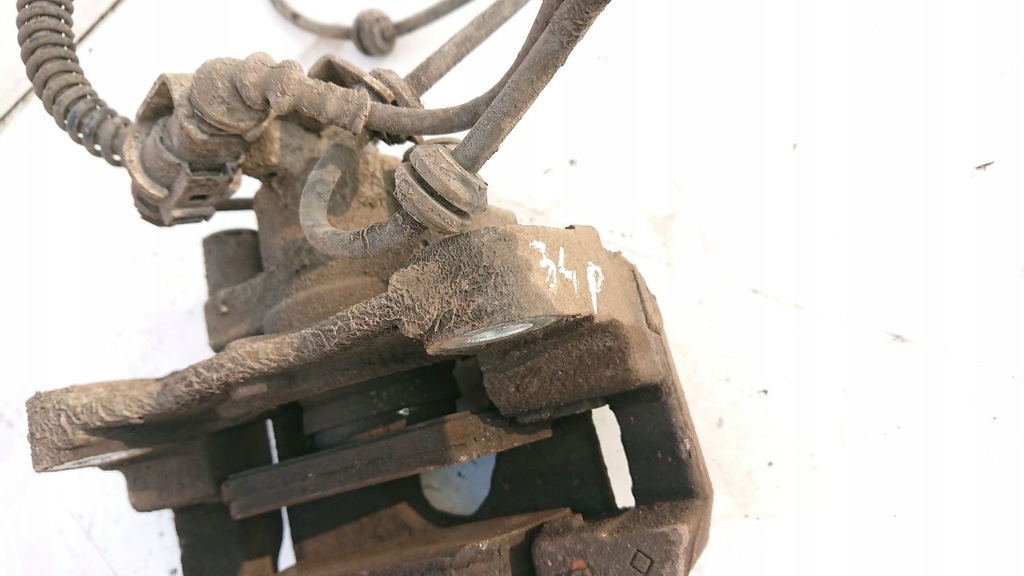 фото №7, Vw touareg супорт гальма правий задня