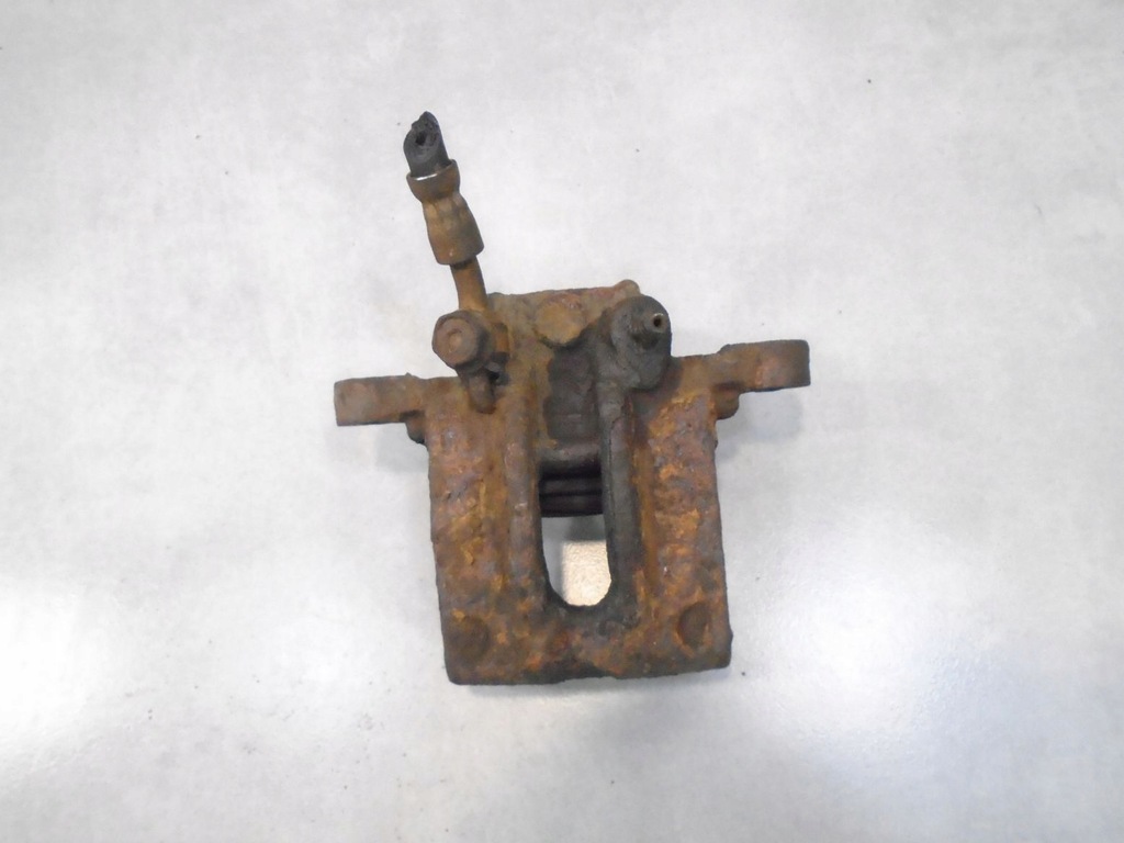 фото №1, Суппорт тормозной левый задняя toyota corolla ix e12