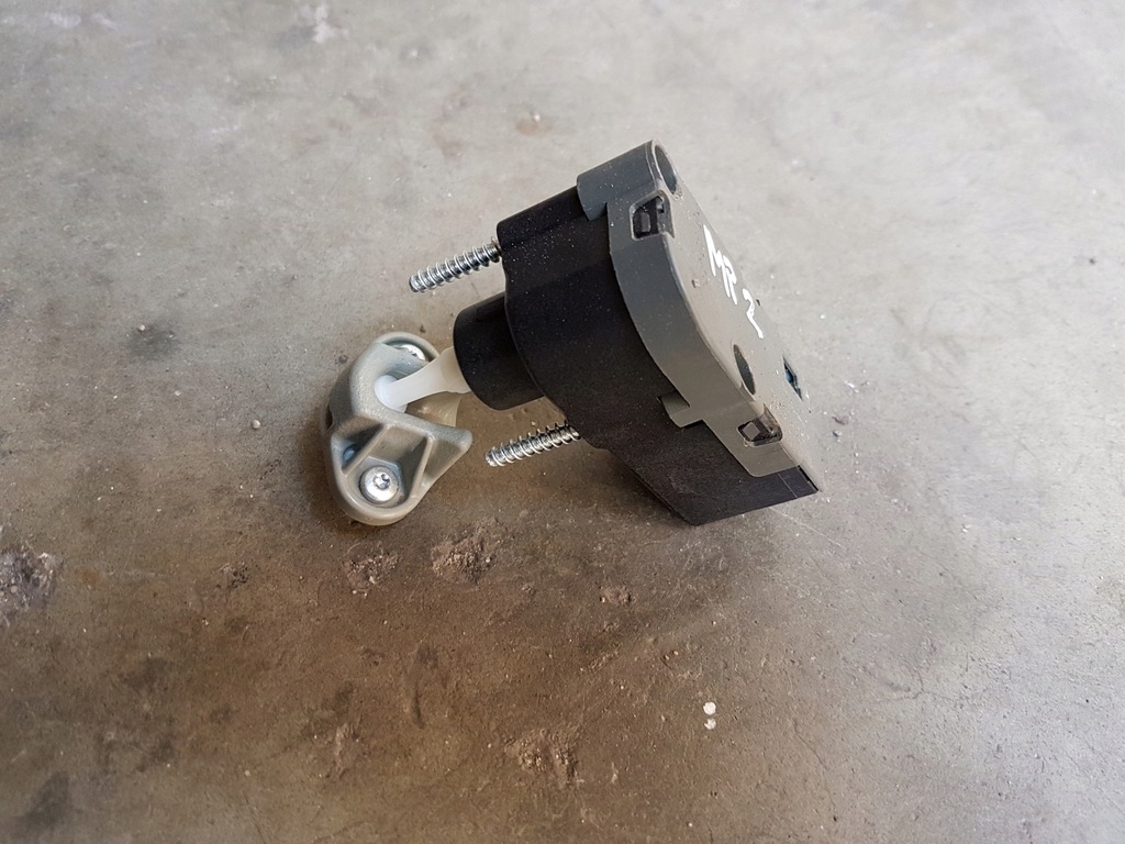 фото №1, Actros mp2 моторчик двигатель регулировки лампы передний