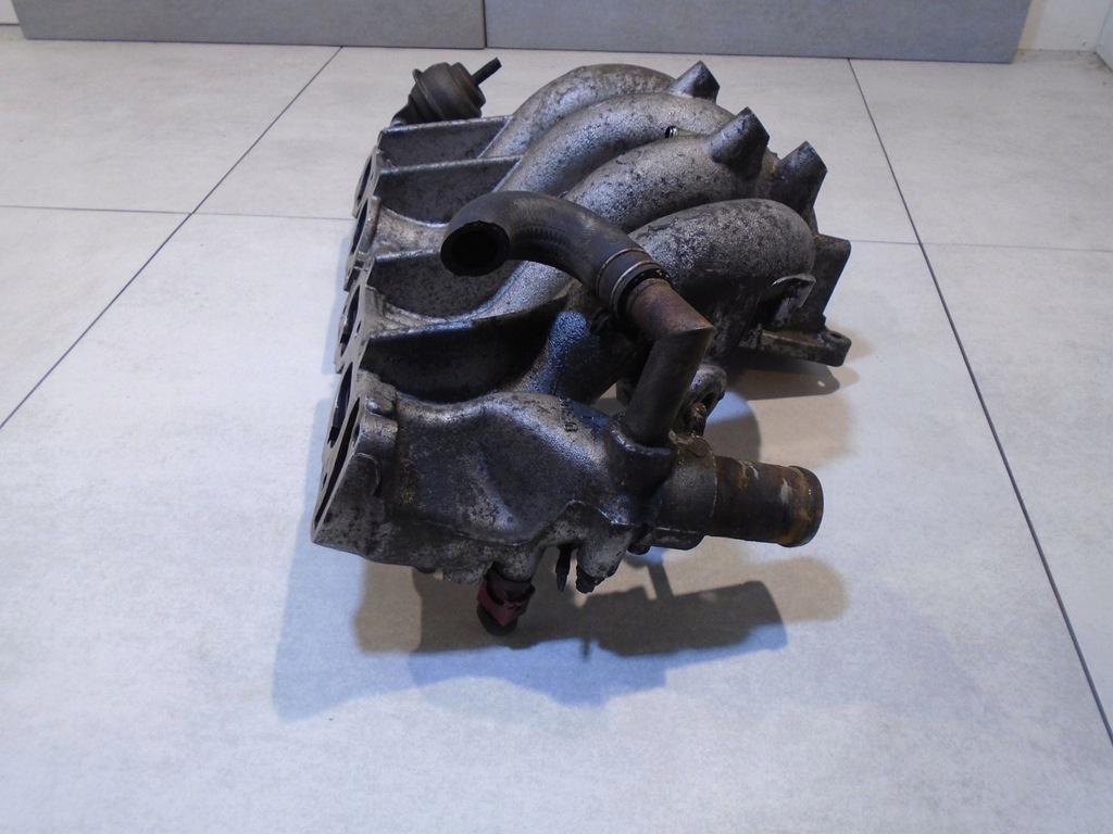 фото №7, Колектор всмоктуючий проставка ford maverick i 2.4b