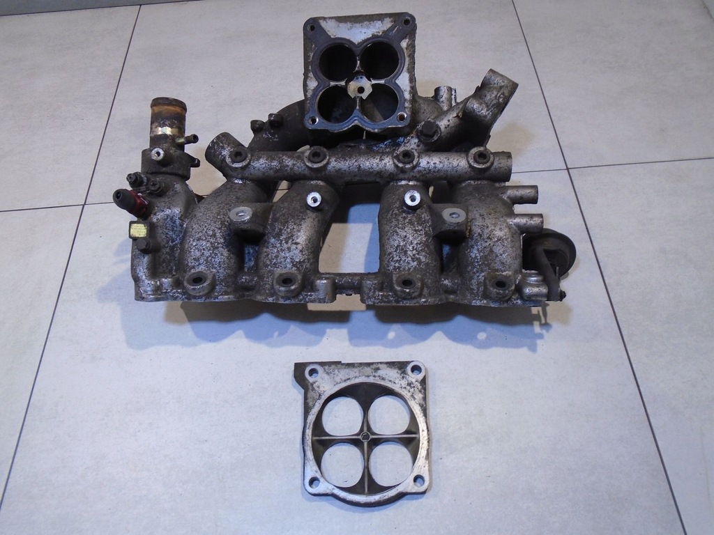 фото №1, Колектор всмоктуючий проставка ford maverick i 2.4b