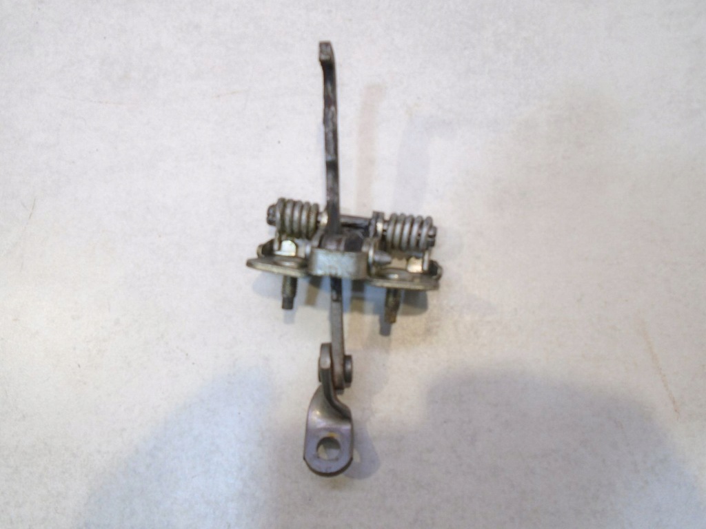 фото №3, Обмежувач двері правий перед dacia logan i