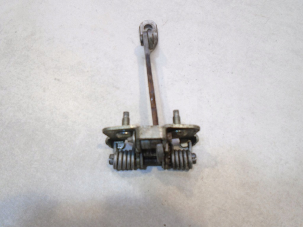 фото №4, Ограничитель дверь левый задняя dacia logan i