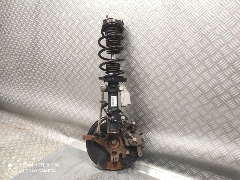 фото №1, Поворотный кулак левая амортизационная стойка ford transit courier