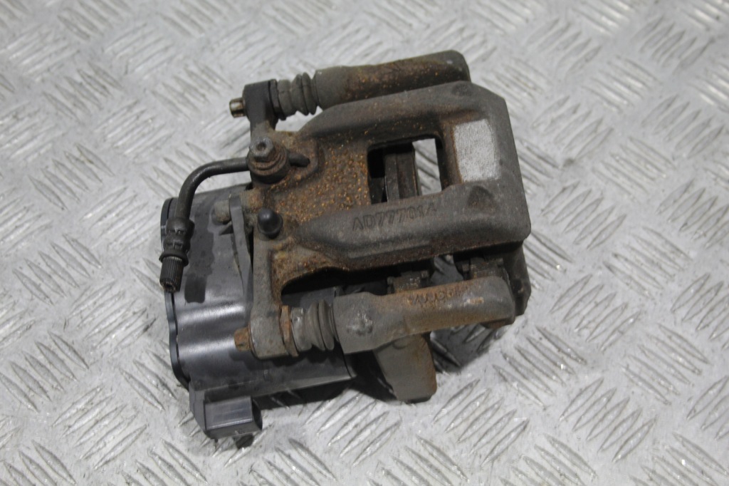 фото №1, Супорт гальмівний лівий задня peugeot 3008 ii 2