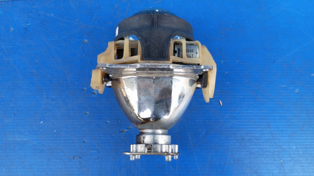 Линза фары передок  ксенон 89380611 opel corsa d Доставка