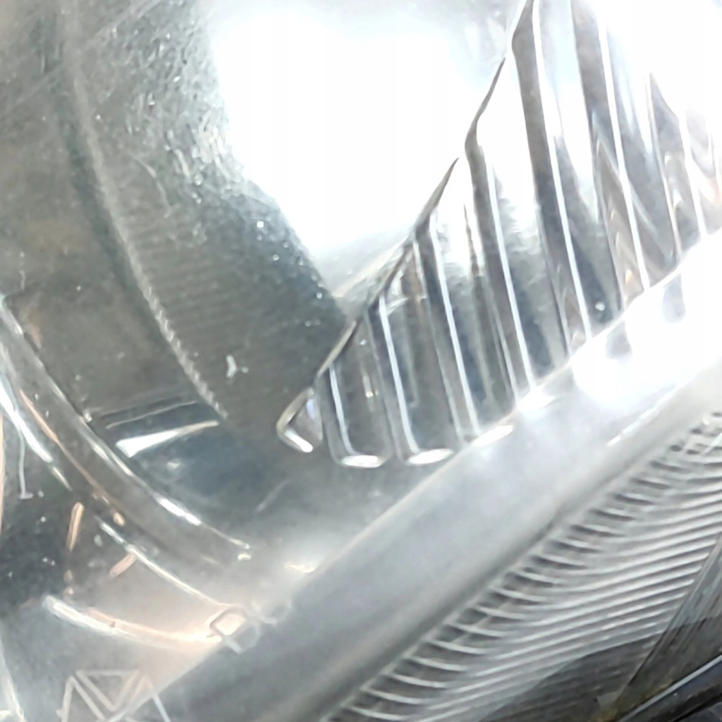 фото №7, Chrysler voyager 2005 левая сторона лампа передняя