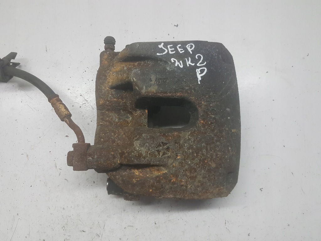 фото №1, Grand cherokee wk2 супорт гальмівний правий перед