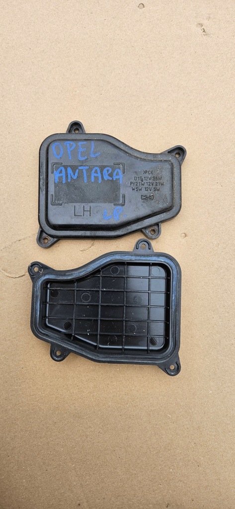 Купити Opel antara ксенон заглушка накладка кришка фара ліва