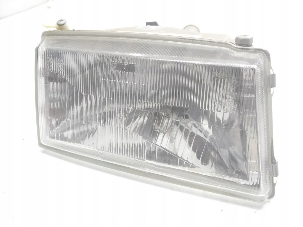 Фара правий перед fiat uno оригінальний номер 7642685 Ціна