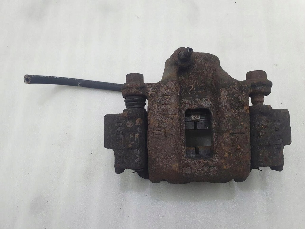 фото №1, Суппорт тормозной левый задняя ford ranger i 2.5