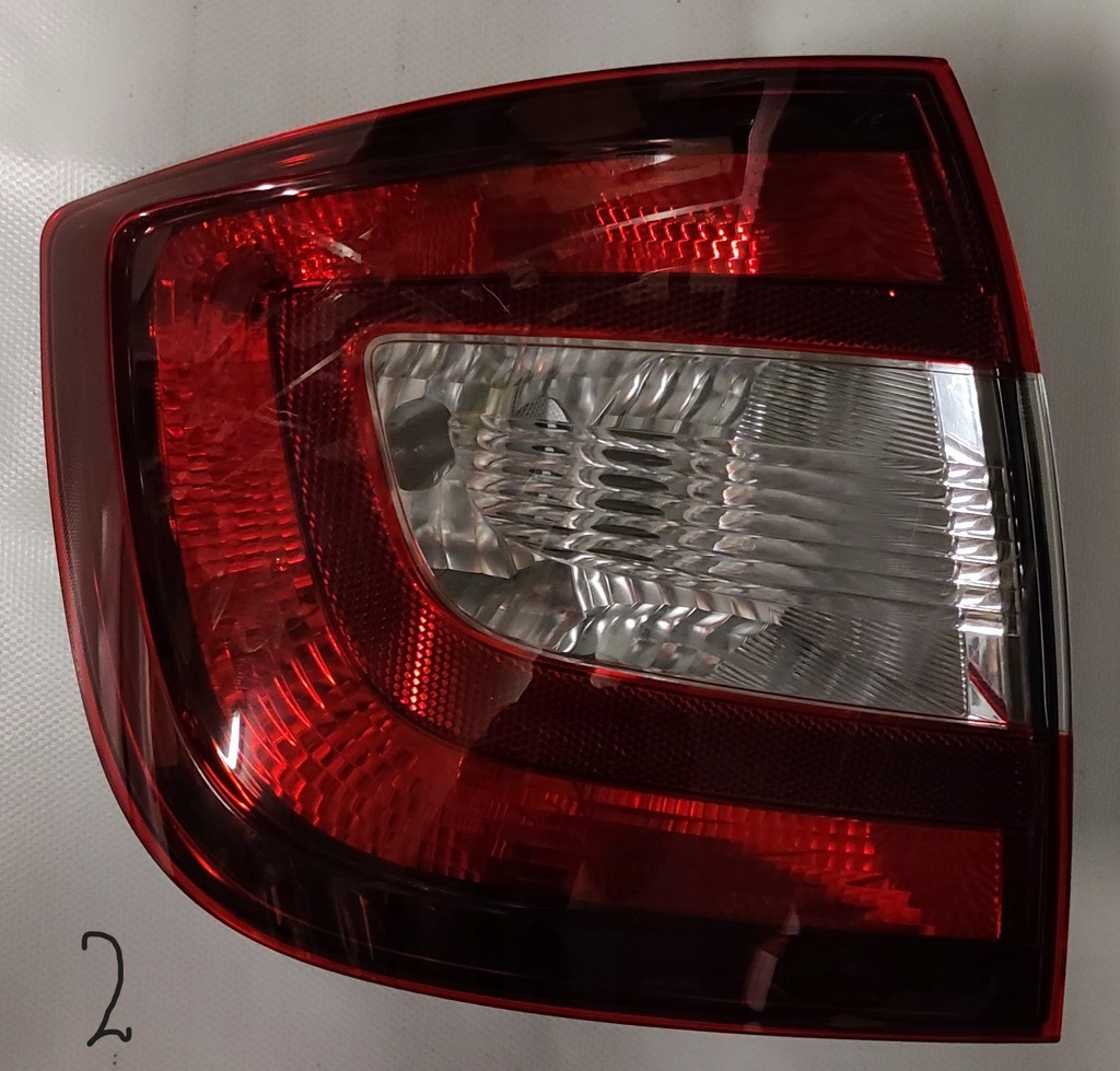 фото №1, Skoda rapid 2012- liftback лампа задняя левая тонированная 5jh945095a