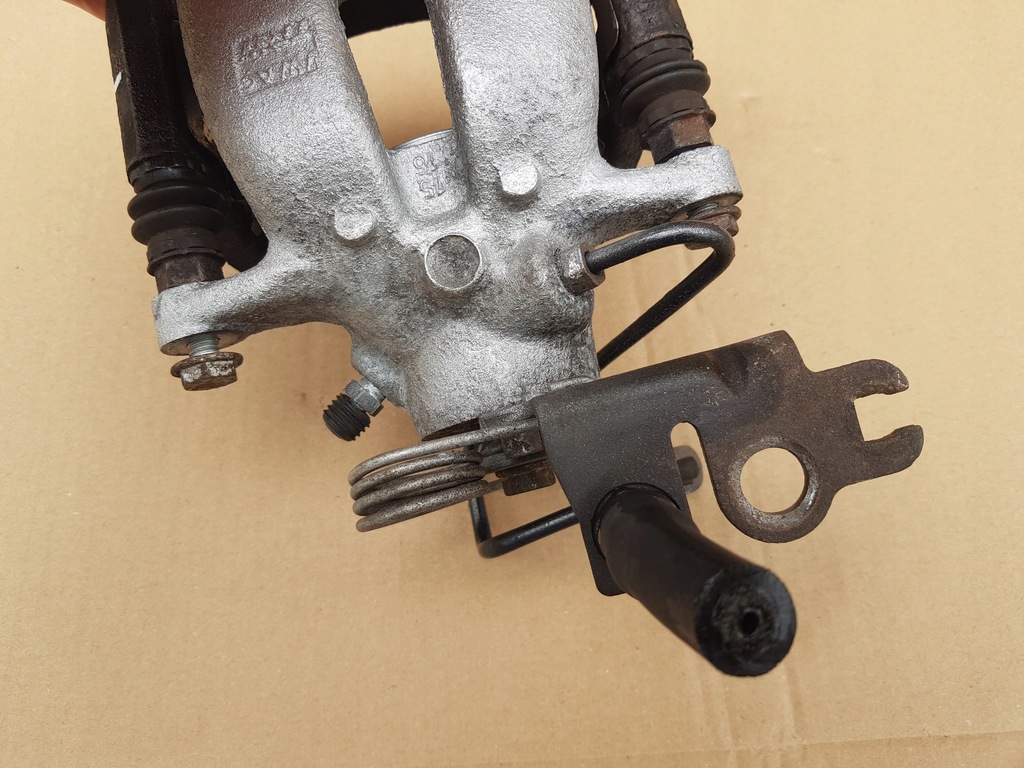 фото №10, Супорт гальмівний + скоба лівий задня / vw caddy iii / 41mm 256mm перевірений