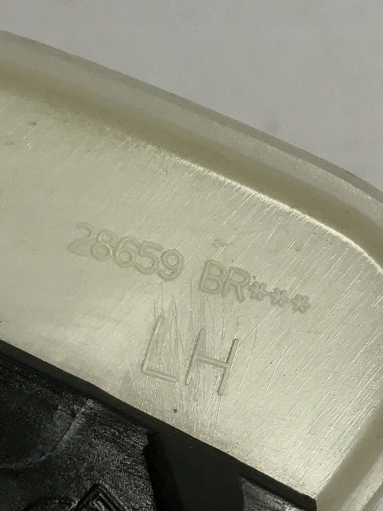 фото №7, Nissan micra k14 левая заглушка распылителя лампы передней 28659