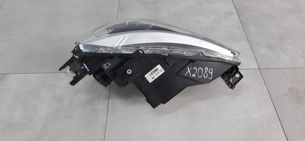 Купити Opel combo e лампа перед ліва 90145357