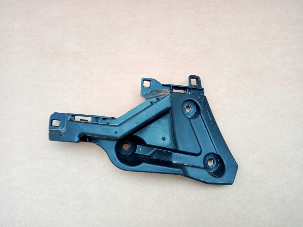 фото №1, Opel astra l лівий напрямна бампера задня