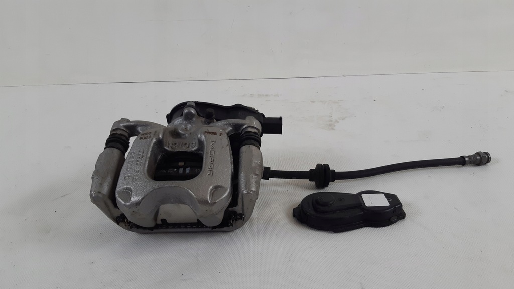 фото №1, Jeep compass ii 1.4 mta супорт гальма лівий задня