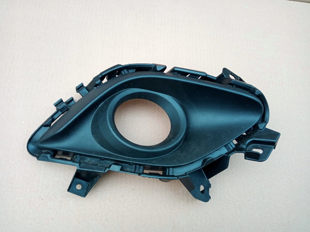 фото №1, Mazda оригінальний номер chr4-50c11 решітка бампера передня p