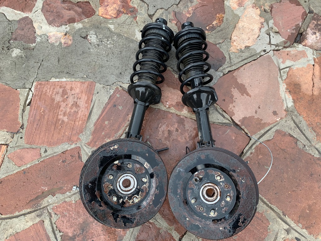 фото №1, Freelander i поворотный кулак амортизатор задняя левый