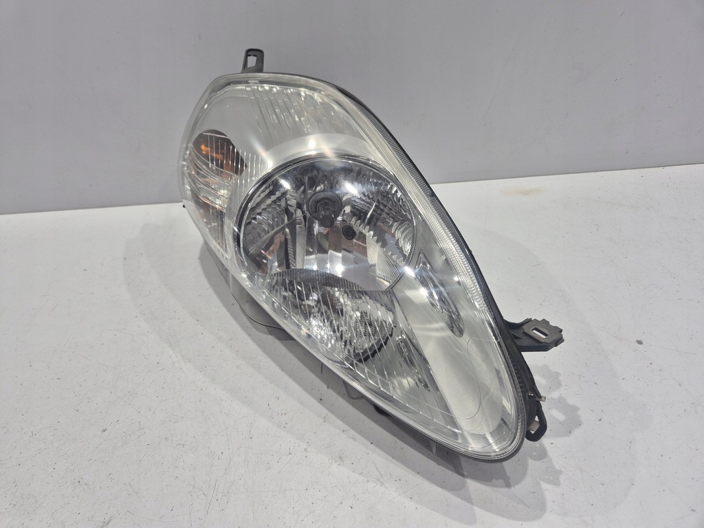 фото №1, Лампа права фара fiat grande punto fioletowa штекер 89101388dx