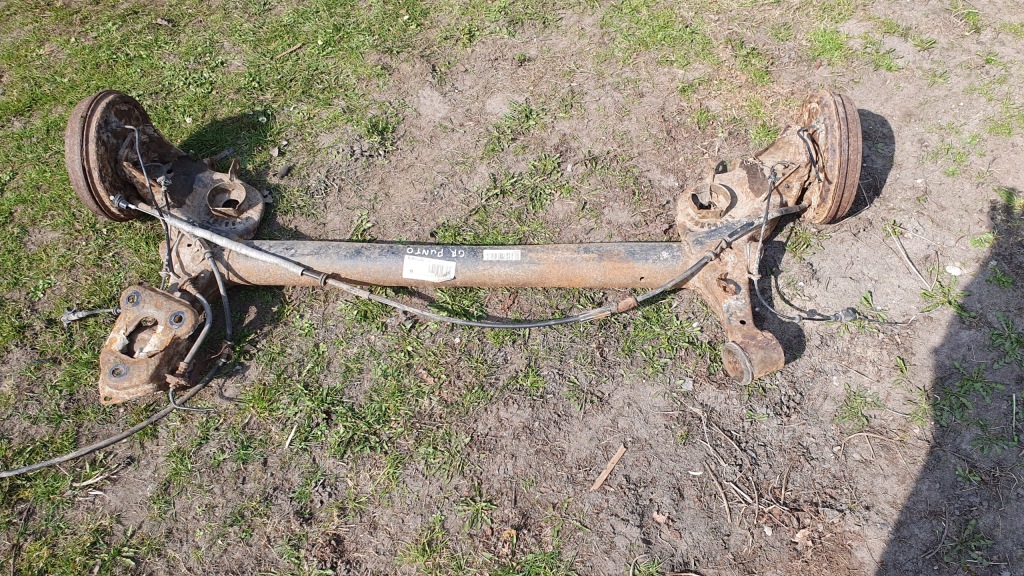 Fiat grande punto - вісь  балка задній Доставка