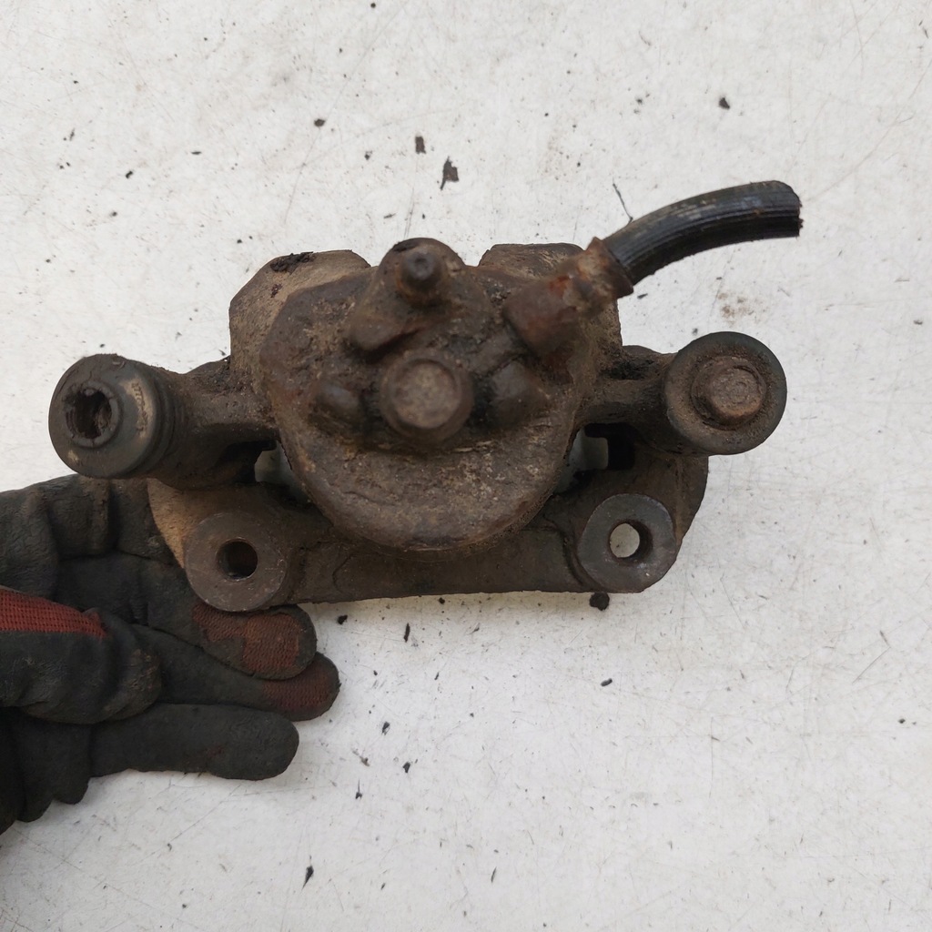 фото №14, Suzuki jimny суппорт тормозной левый перед